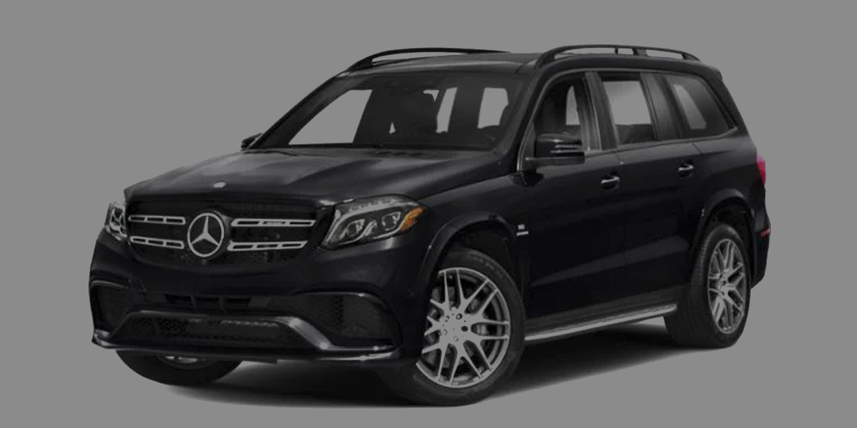 Black Mercedes-Benz GLS luxury SUV photographed against a gray background.
